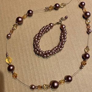 23” necklace beaded and threaded. Bracelet beaded. Taupe Amber clear crystals.